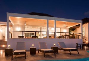 Villa with white aluminium sliding doors